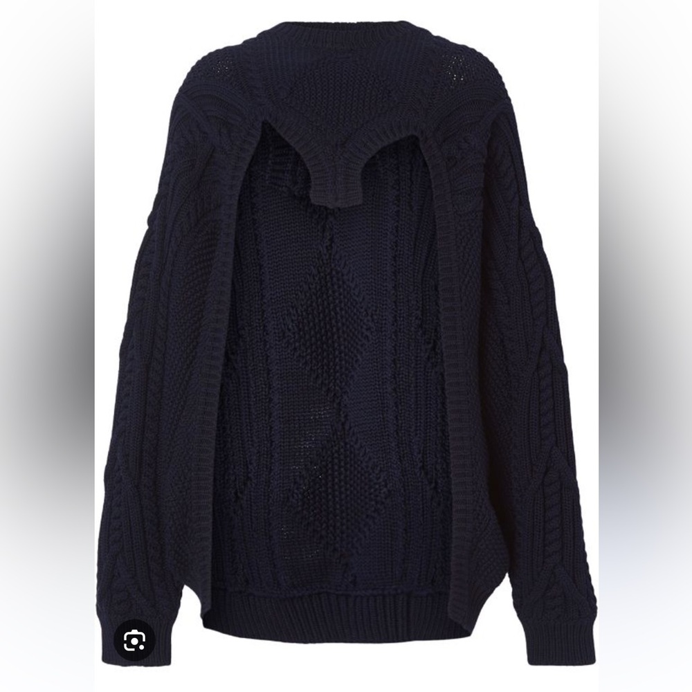Brand new with tags BURBERRY ink blue cutout cable knit sweater. Blue in color.